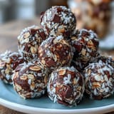 A tray of Soccer Game Snacks: Energy Balls with Oats and Chocolate Chips, featuring chewy oats and melty chocolate chips, perfect for pre-game energy.